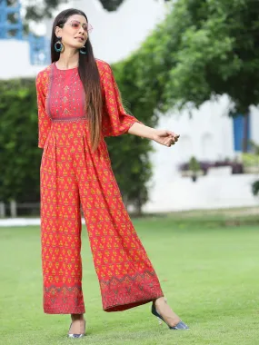 Juniper Coral Ethnic Motif Printed Rayon Flared Jumpsuit.