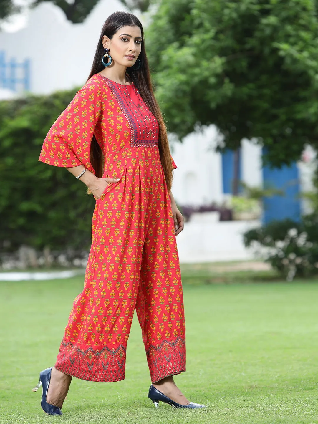 Juniper Coral Ethnic Motif Printed Rayon Flared Jumpsuit.